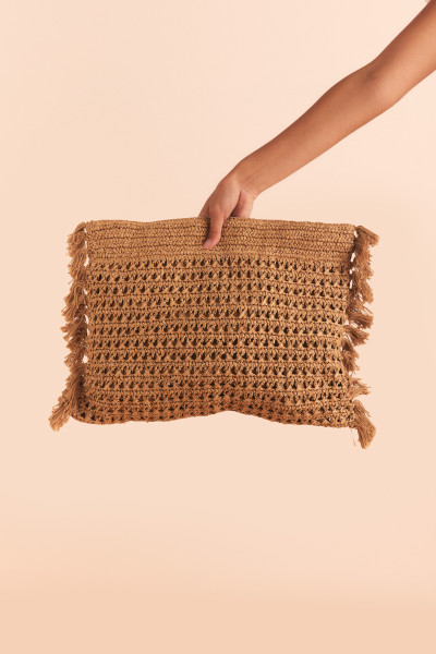 A burst of colour and craft, this cotton crochet mini bag features a zipper closure with leather tassel and straps. Lightweight and artisanal, it’s the perfect playful companion for casual days and festival nights.