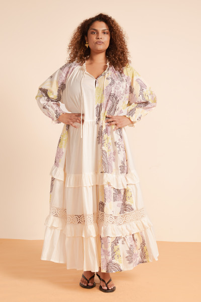 This Bohemian Traders 'Castello' tiered dress as a sartorial cheat code for an effortless outfit. It's cut from a breezy cotton and patterned with a delicaley placed paisley print. The lace inserts, ruffle neckline and loose fit make it a warm weather essential.