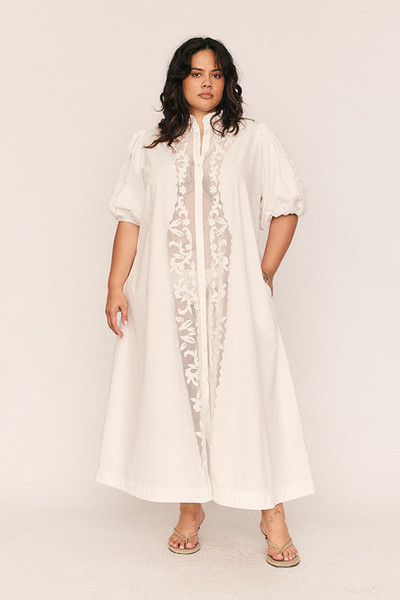This romantic dress is inspired by the effortless style of the Australian coast. It's cut from crisp cotton-poplin with delicate appliqued flowers and vines to the front. Temper the blousen sleeves by cinching the waist.