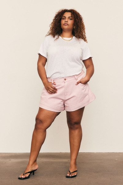 In premium rigid denim, the High Waist Mini Short in Ice Pink offers a feminine twist on a classic silhouette. With its structured A-line shape and high-rise waist, it delivers all-day comfort and confident style. A natural-fibre essential designed for timeless wearability and effortless ease.