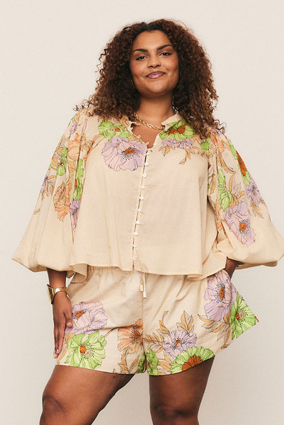 The Venice Puff Sleeve Blouse captures bohemian artistry in soft cotton voile, adorned with Bohemian Traders’ in-house Venice Cream placement print. A mandarin collar and voluminous sleeves create graceful proportion, while the relaxed fit offers ease and movement. Light and effortless, it’s the perfect blouse for sun-drenched days or elevated evenings alike.