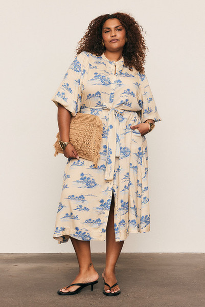 Effortless and elegant, the Kauai Drop Waist Shirt Dress is crafted from soft viscose in Bohemian Traders’ exclusive Kauai print. With a relaxed drop waist, delicate bell sleeves and a removable tie belt, it drapes beautifully through a midi-length silhouette. Lightweight and breathable, it’s timeless summer dressing - natural, feminine, and easy to wear.
