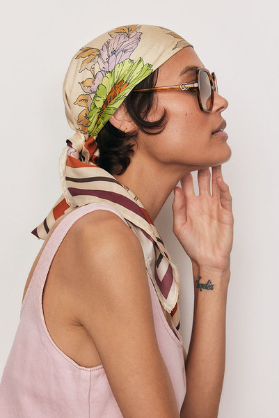 An ode to timeless elegance, the Classic Floral Scarf is crafted from 100% pure silk twill and framed by Bohemian Traders’ exclusive floral placement print. Luxurious and versatile, it can be styled around the neck, tied to a bag handle, or worn as a headscarf. A refined touch of artistry to elevate every look.