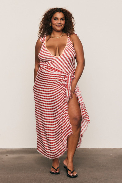 Crafted from luxurious soft modal, the Frayed Sarong is adorned with Bohemian Traders’ exclusive check print and finished with artisanal frayed edges. Lightweight and endlessly versatile, it can be wrapped, tied, or draped to suit every moment. A natural-fibre vacation essential that captures the artful warmth and sophistication of the festive season. Crafted from luxurious soft modal, the Frayed Sarong is adorned with Bohemian Traders’ exclusive check print and finished with artisanal frayed edges. Lightweight and endlessly versatile, it can be wrapped, tied, or draped to suit every moment. A natural-fibre vacation essential that captures the artful warmth and sophistication of the festive season.