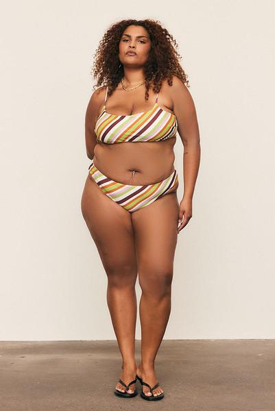 Designed with intention, the Maggie Stripe Bikini Set blends thoughtful construction with effortless confidence. Crafted from soft, matte stretch fabric in Bohemian Traders’ custom in-house stripe print, this supportive style features removable cups, adjustable straps and a mid-rise brief for balanced coverage. Perfected through fittings on real women, it delivers a truly size-inclusive, flattering fit for every shape.