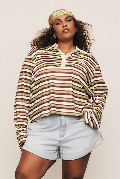 A modern take on an off-duty classic, the Maggie Rugby Tee is cut from soft, slinky polyester in multi-coloured stripes. Designed with a contrast collar, long wide sleeves, and embroidered logo, it blends nostalgic sport styling with everyday dressing. Wear it loose or belted for bold, relaxed refinement that feels unmistakably Bohemian Traders.