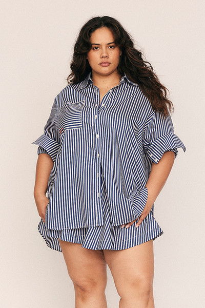 Timeless and versatile, the Stripe Classic Shirt is crafted from a premium Rayon–Tencel blend in a crisp stripe that drapes with ease. Designed in an oversized silhouette with a classic collar and subtle red Bohemian Traders embroidery, it pairs perfectly with the matching Stripe Short for an elevated, coordinated take on modern summer shirting.