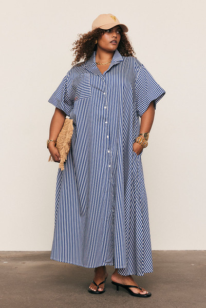 A reinvention of our best-selling Opera Shirt Dress, this new-season update arrives in a soft Rayon–Tencel blend with short sleeves and a camp collar, reimagined for high summer. Refined red Bohemian Traders embroidery adorns the chest, while the fluid stripe fabric and relaxed tailoring offer effortless versatility — the perfect balance of structure and ease.