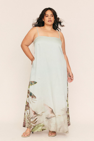 Sleek, understated, and designed to glide, The Canopy Maxi Gown is a study in elegance. Cut from lightweight matte satin with a painterly Bohemian Traders placement print, this mixi-length column dress falls fluidly with every step.