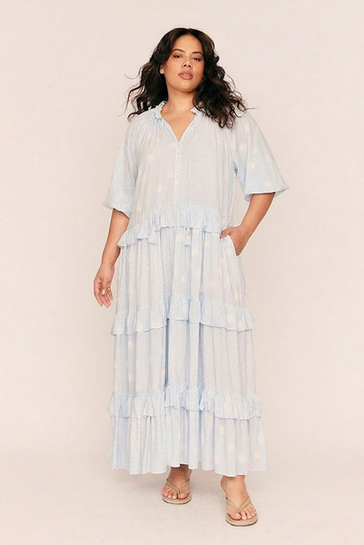 Romantic by nature and effortless by design, the Dott Ruffle Neck Maxi captures the soul of soft dressing. Crafted from smooth rayon in Bohemian Traders’ exclusive in-house print, this easy maxi dress drapes with fluid movement and gentle structure.