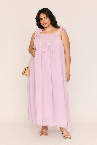Feminine, flattering, and softly romantic, the Trim Slip Maxi is made for slow afternoons and moonlit evenings. Crafted from lightweight lilac crepe georgette and fully lined in self fabric, it drapes with a gentle swish and a touch of whimsy.