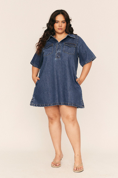 Relaxed yet refined, the Swing Denim Mini Dress is your everyday uniform—reimagined in heavyweight premium cotton denim. Its A-line, boxy silhouette offers an intentionally oversized fit, balanced by sharp details like a classic collar, dropped shoulders, and short sleeves.