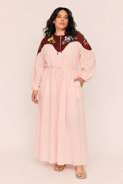 Whimsical yet grounded, the Fruito Bib Smock brings artistry to everyday wear. Crafted from soft cotton voile with a textured cotton yoke, this oversized silhouette is adorned with embroidered fruit motifs—a signature touch from Bohemian Traders’ in-house design team.