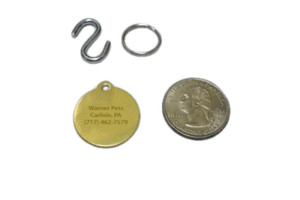 Warner Brand brass circle ID hanging pet tag with custom engraving. Warner Brand brass circle ID hanging pet tag with custom engraving.