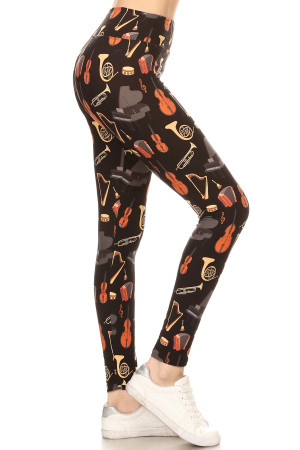 Right side view image of our Buttery Smooth Musical Instrument High Waisted Plus Size Leggings with a neutral toned instrument print that features pianos, harps, violins, and more on a black fabric base.