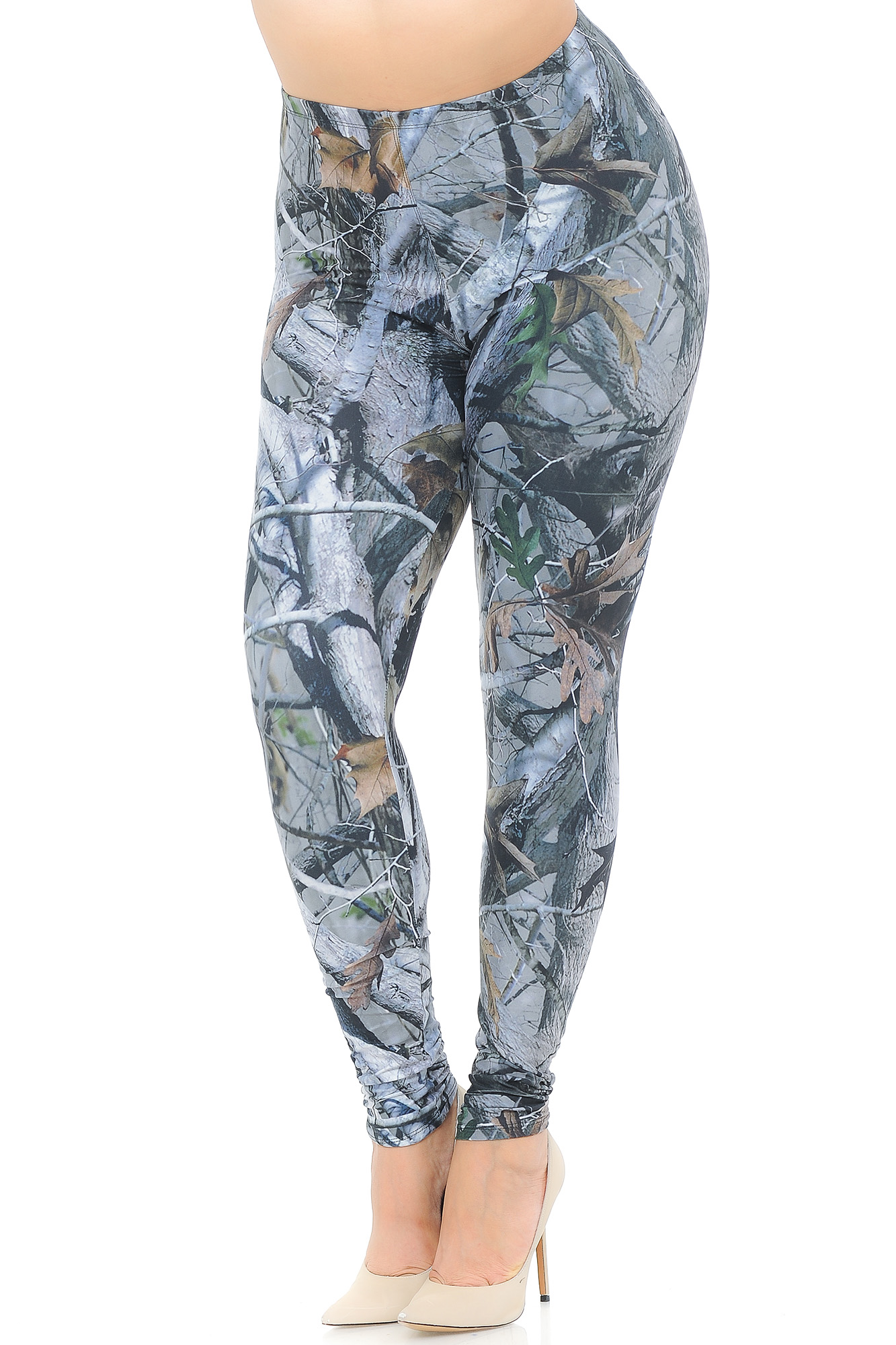 Angled front view image of our Creamy Soft Camouflage Trees Plus Size Leggings - USA Fashion™ featuring a super cool photorealistic nature inspired gray toned tree and branch design with sparsely placed brown and green leaves.