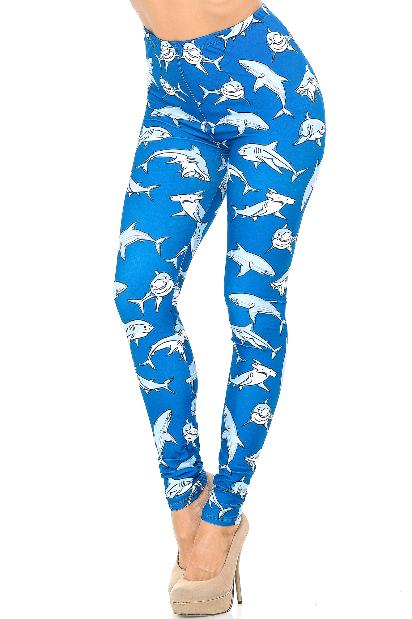 Angled front view image of Creamy Soft Shark Plus Size Leggings - USA Fashion™ with an all over mixed shark print on a bright blue background.
