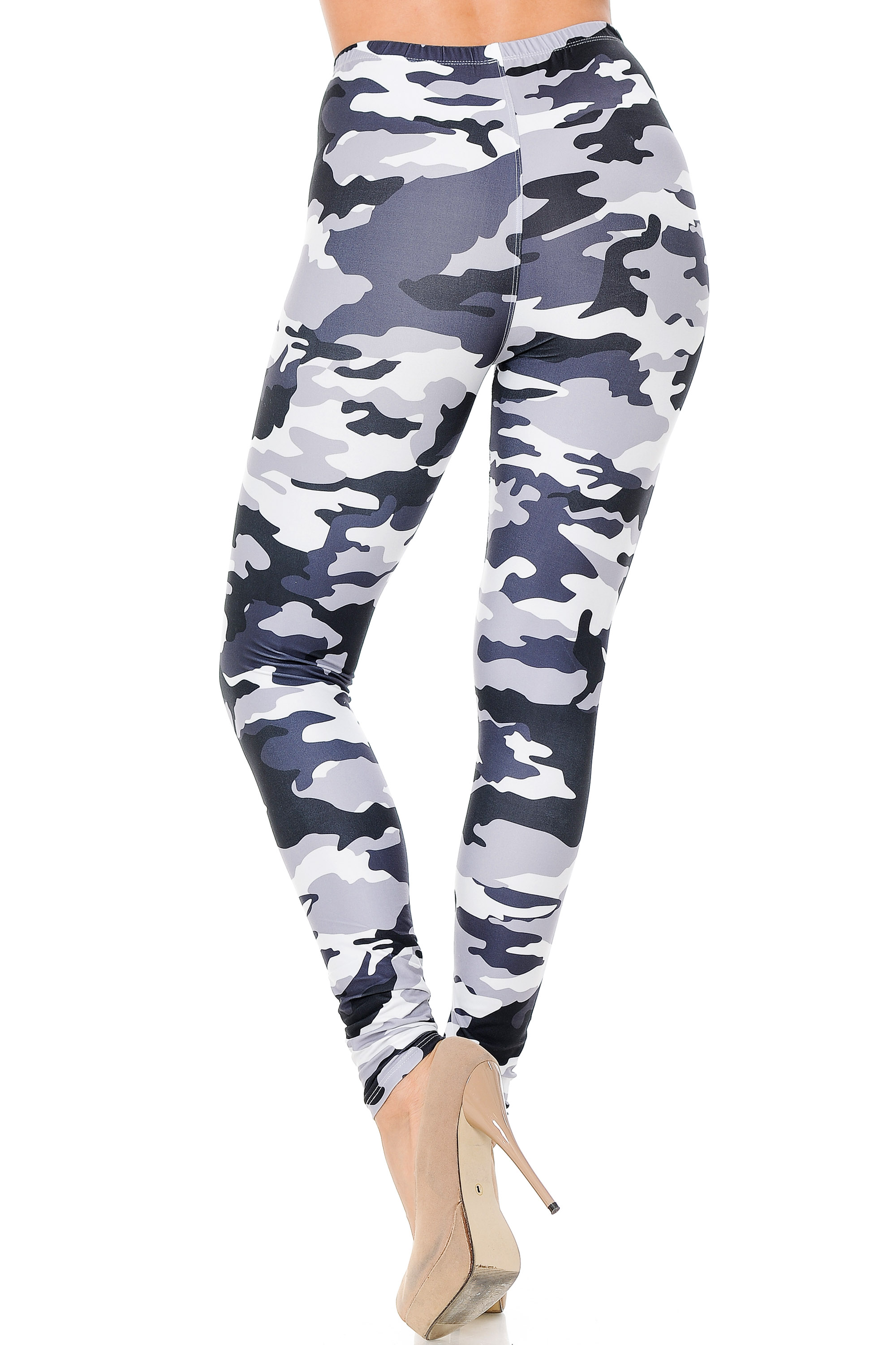 These Creamy Soft Black and White Camouflage Plus Size Leggings feature a flattering body-hugging fit.