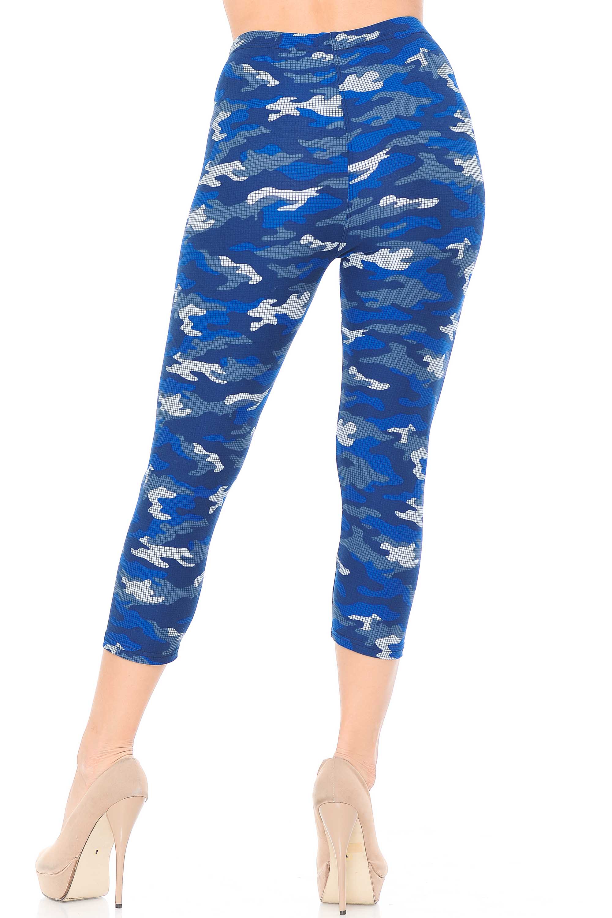 Our Buttery Smooth Blue Grid Camouflage Plus Size Capris feature a comfort elastic stretch waistband and come up to about mid rise.