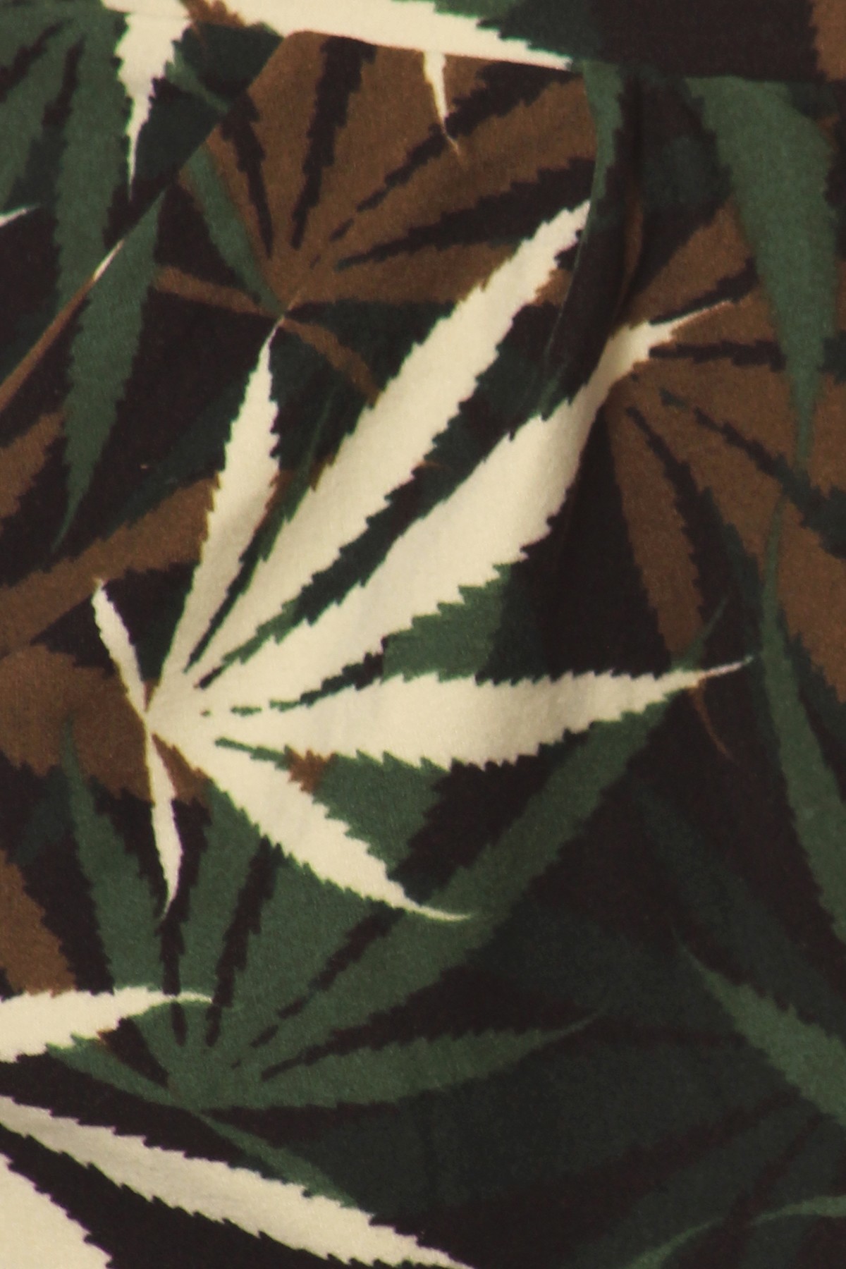 Close up swatch of Buttery Smooth Earthen Marijuana Capris