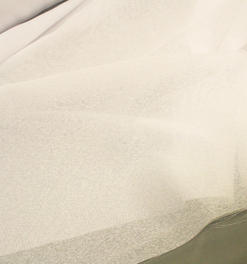 White 300cm wide voile with snowflake texture
