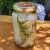 Ingredients list showing gin, cucumber, and spices