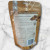 Back of Nutworks Macadamia Brittle pouch showing ingredients, nutrition panel, allergy info and brand story from Queensland, Australia