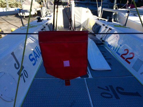 The Sail22 Protest Flag. Easily attaches to your boat with velcro. Quick pull tab too. Environmentally friendly...no tape needed! 