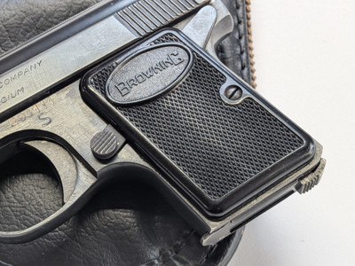 Mint Condition Baby Browning 25 auto pistol with Original Bag