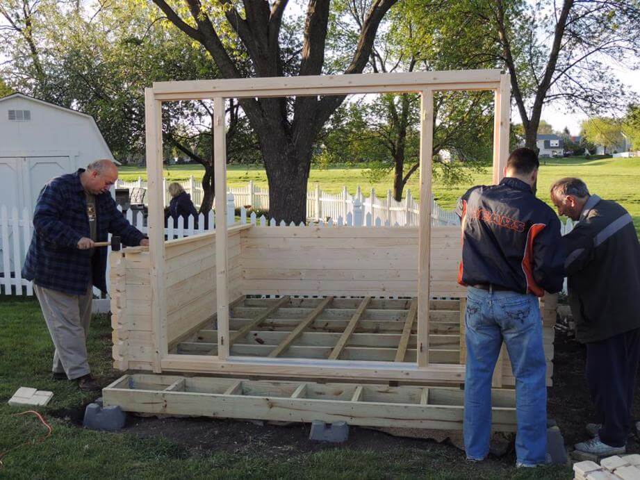 Treated wood frame on concrete deck blocks