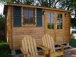 Aspen garden shed next to lake