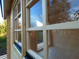 Closeup window view of Whales garden shed