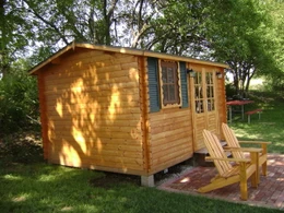 Aspen garden shed next to pond