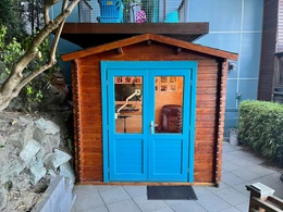 Small home office shed tight fit under the balcony
