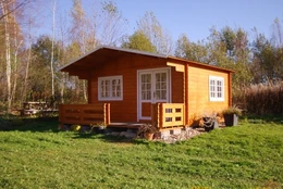 Dakota cabin with customized veranda deck and add-on window