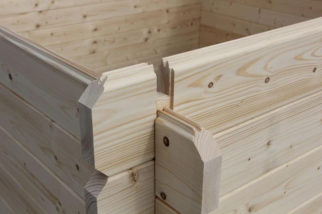 Close-up of the precision interlocking corner joinery on a Norway spruce kit