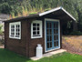 Whales garden shed with living roof