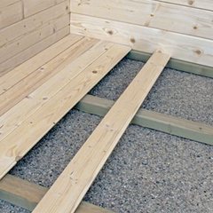 Our floor kit: tongue-and-groove floor boards on pressure-treated joists