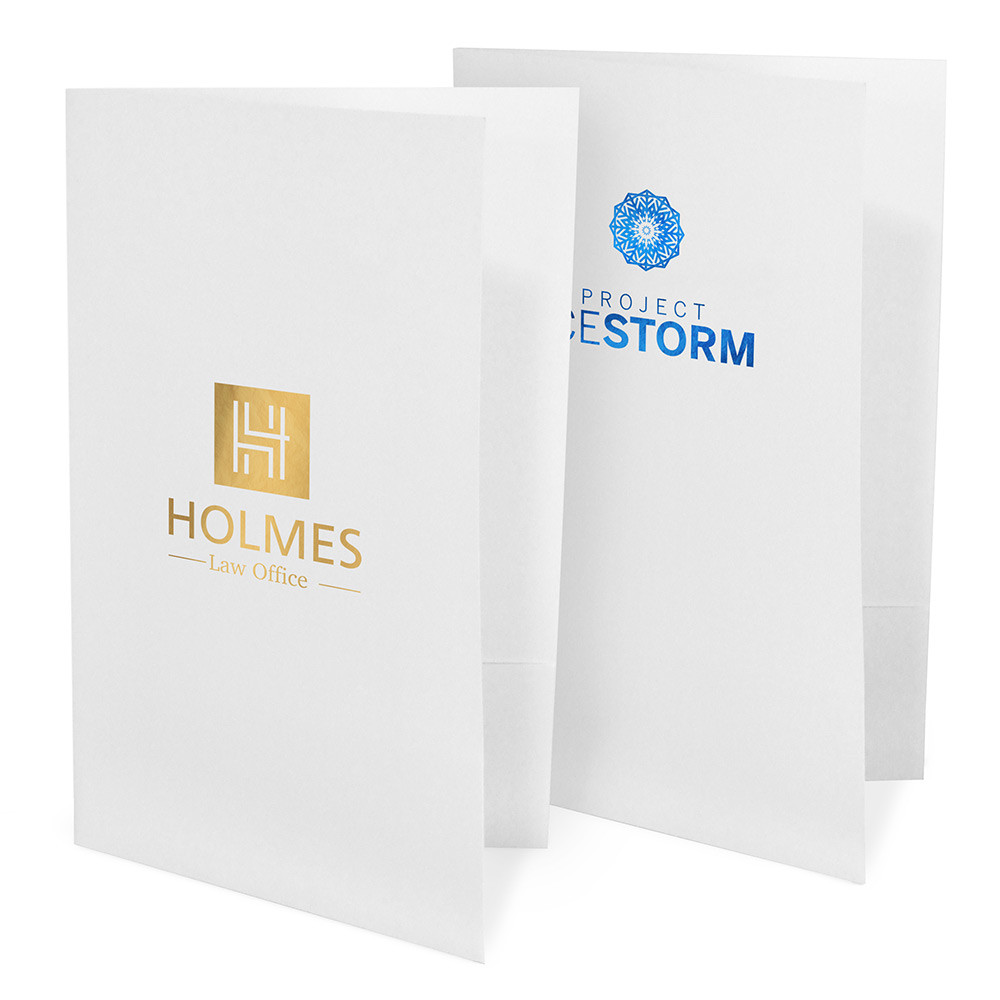 Legal folders with gold and blue foil logo imprints on white paper