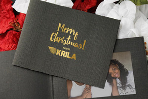 Black portrait folder with gold foil logo imprint Black portrait folder with gold foil logo imprint