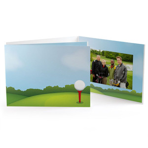 Golf course illustration with golf ball on tee against a blue sky with a few fluffy clouds. Photo folder for 4x6 pictures. Golf course illustration with golf ball on tee against a blue sky with a few fluffy clouds. Photo folder for 4x6 pictures.