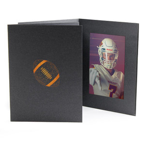 Vertical black photo folder with football icon stamped in copper foil Vertical black photo folder with football icon stamped in copper foil