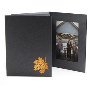 Black vertical photo folder with copper foil stamped autumn leaf design on the front cover Black vertical photo folder with copper foil stamped autumn leaf design on the front cover