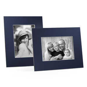 Blank navy blue cardboard frames in horizontal and vertical format Blank navy blue cardboard frames in horizontal and vertical format