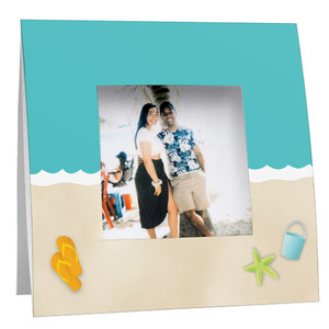 Tropical beach-themed Polaroid frame with the water meeting a sandy beach. Tropical beach-themed Polaroid frame with the water meeting a sandy beach.