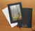 Black photo insert card with gold foil photo studio logo imprint on the back cover Black photo insert card with gold foil photo studio logo imprint on the back cover