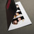 Corner-cut slits hold a 2x6 photo booth strip