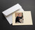Ivory wallet photo card with white mailing envelope.