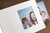 White slip-in photo folder for holiday event favors