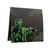 Back of frame has a large image of the green and black zombie, arms outstretched Back of frame has a large image of the green and black zombie, arms outstretched